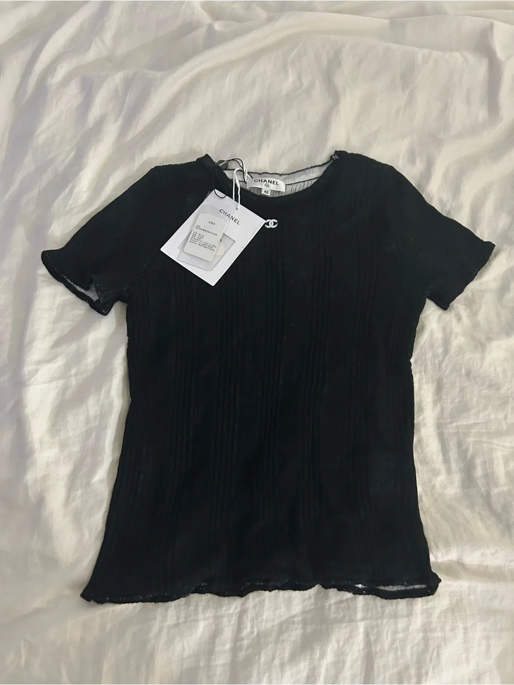 New CHANEL Black Ribbed Short Sleeve Knit Tee with Logo Charm